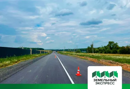 Разметки и разделительные полосы на подъездной дороге к поселку «Династия»