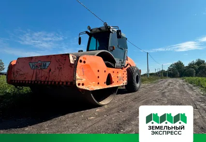 Укатка асфальтной крошки внутрипоселковых дорог в поселке "Калина"