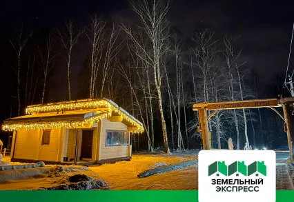 Монтаж гирлянд во въездной группе поселка "Лесной Остров"