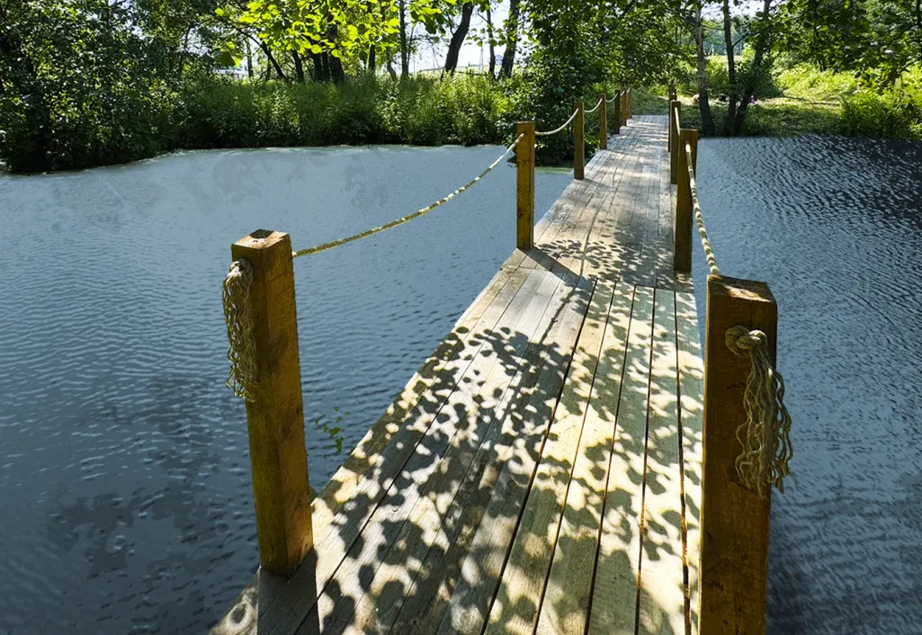 В КП «Династия» завершено строительство нового моста через реку