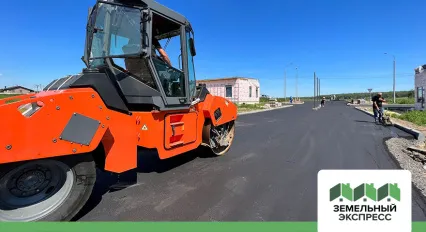 Работы по асфальтированию въезда в поселок «Фаворит»